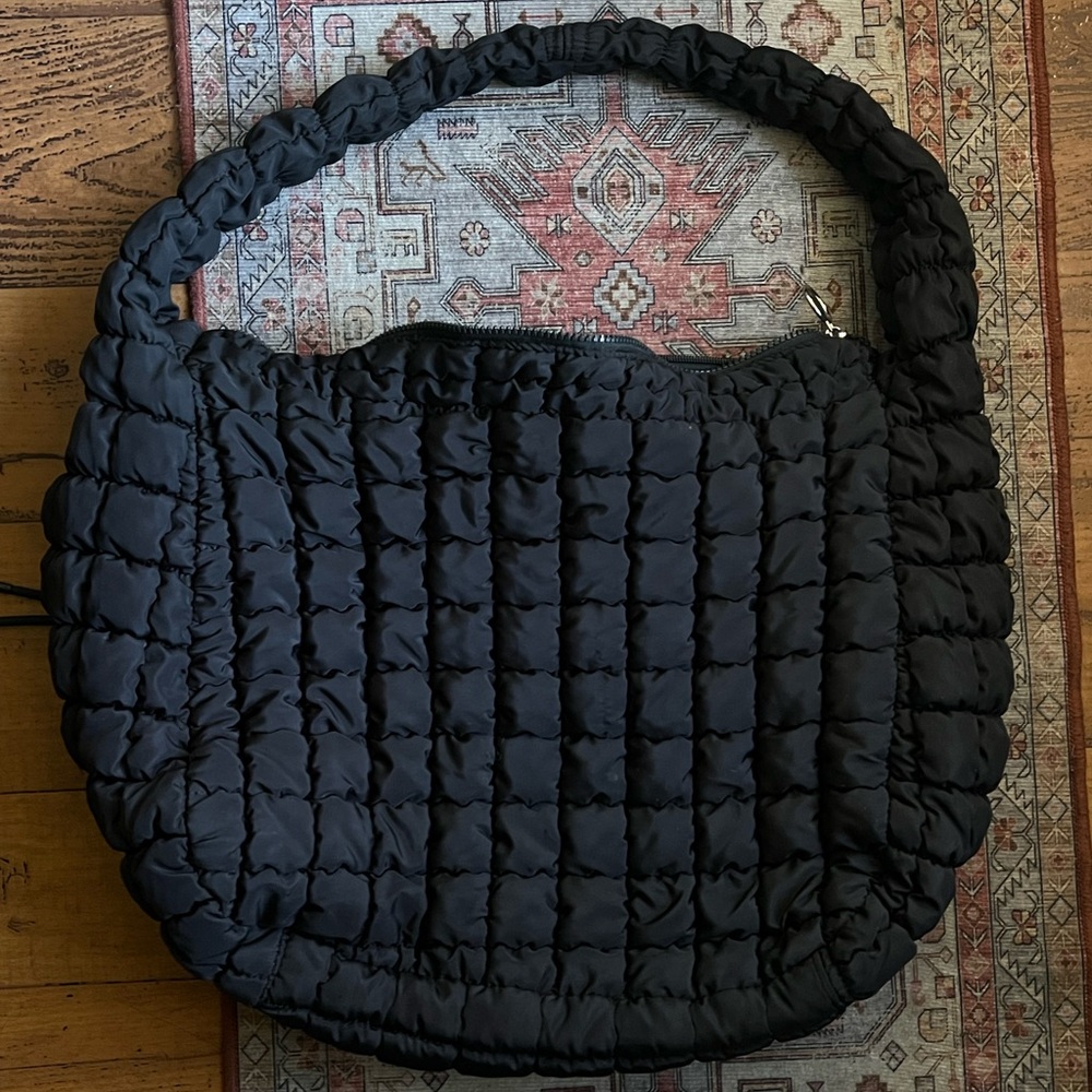 Free people movement quilted black bag used and in great conditions